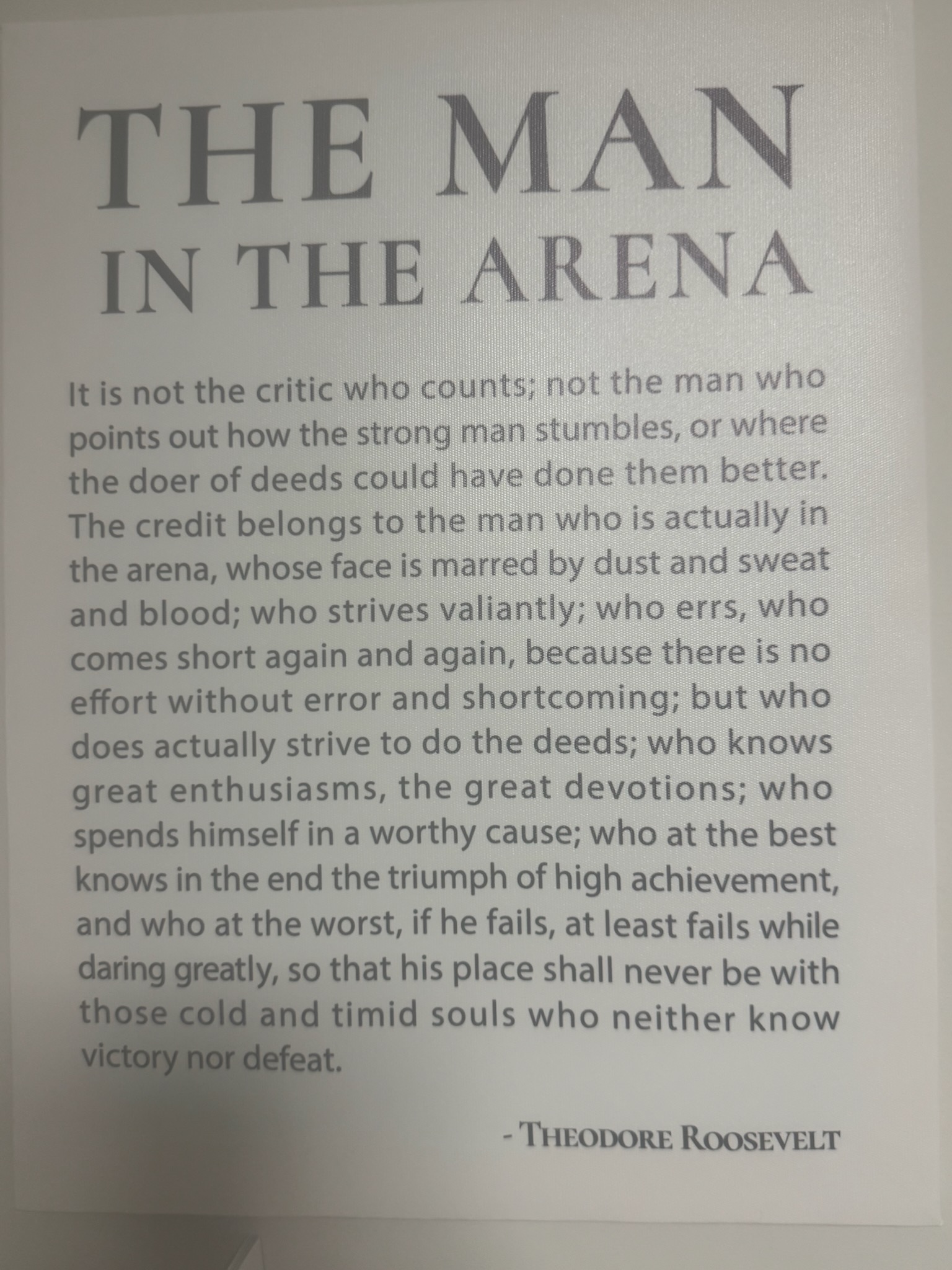 Canvas poster of Theodore Roosevelt's 'The Man in the Arena' speech, given to Joseph by his kickboxing coach before his first fight