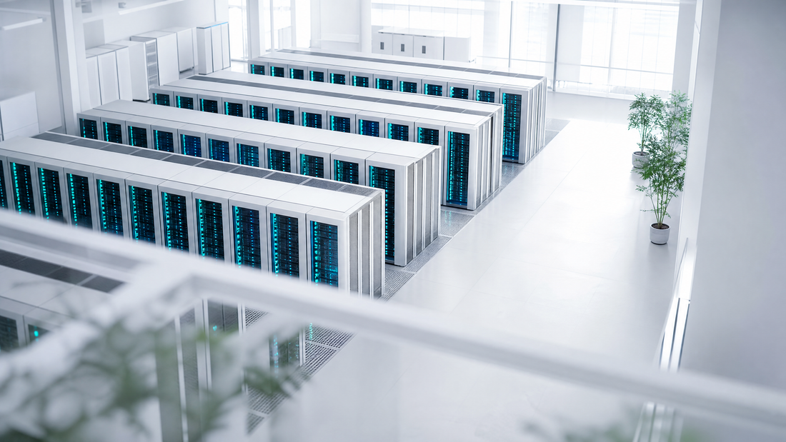 Rows of servers glowing cyan in a high-security data center, viewed from above.